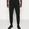 ICANIWILL Stride Men - Tracksuit Bottoms - Black